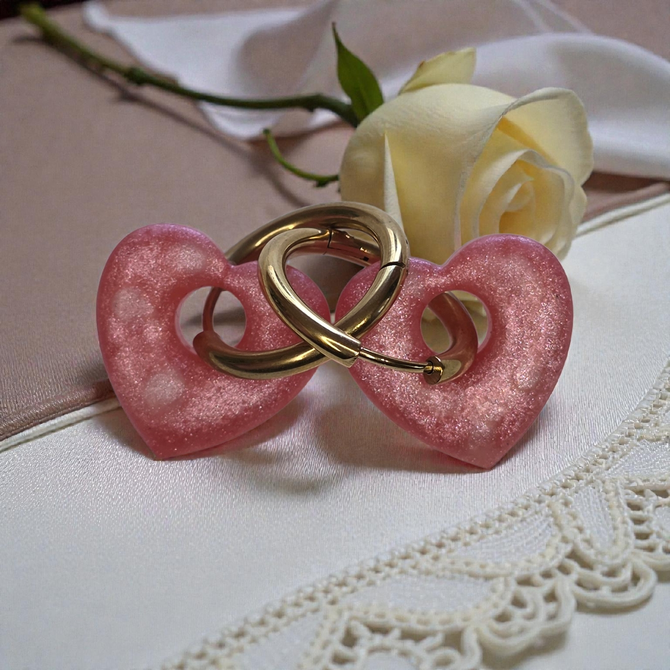 HEART CHARM – Powder pink pearlescent resin on a gold ring