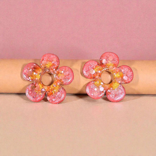 ZEPPLINE LED Earrings – Glittery pink flower; luminous yellow center, sold without hoops
