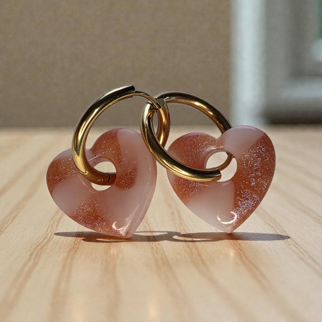 HEART CHARM – Sparkling powder pink resin on a gold ring