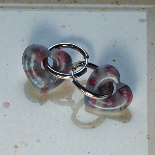 HEART CHARM – Translucent pearly grey resin with pink and bluish inclusions on a silver ring